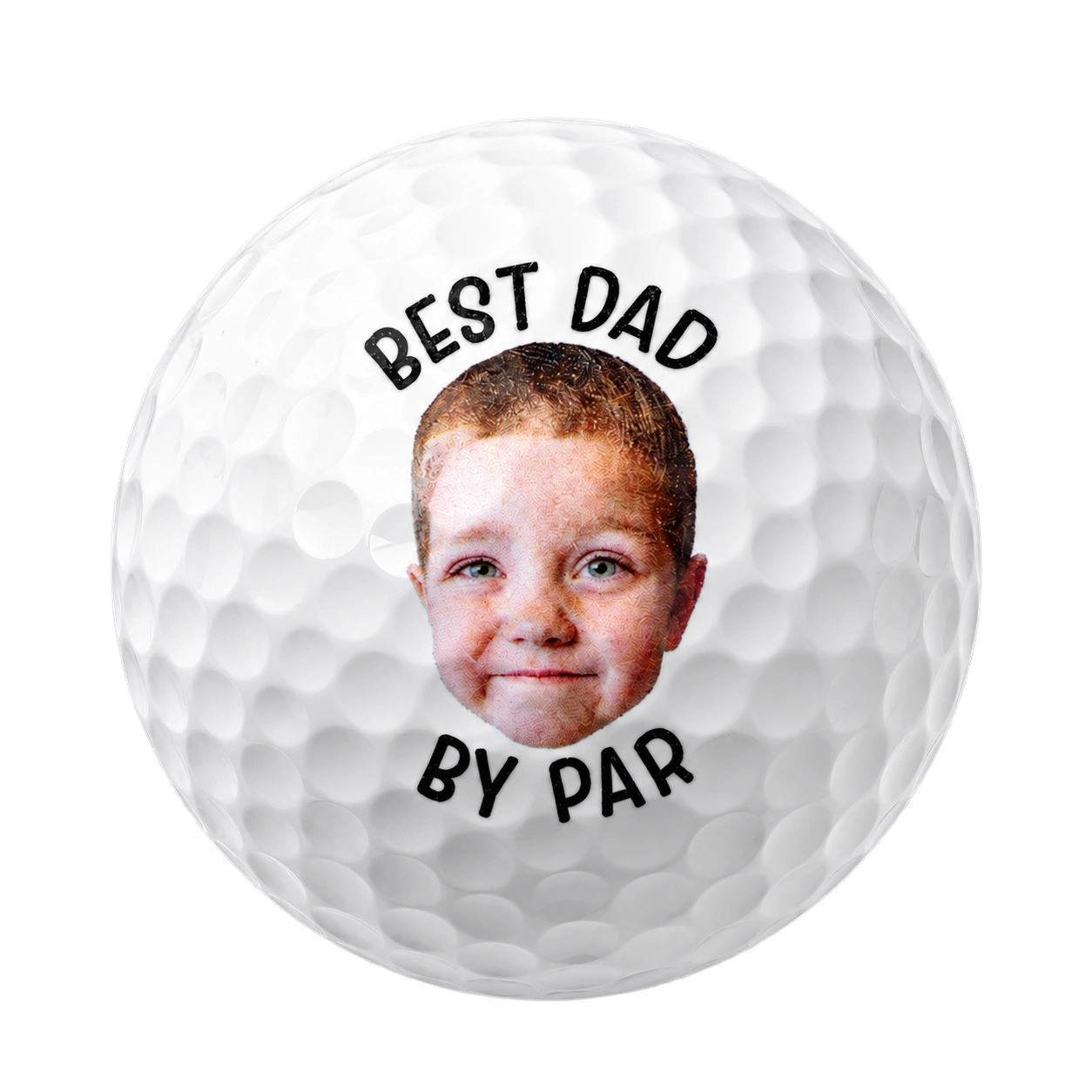 Golf ball printed with a child's face and the words Best Dad By Par